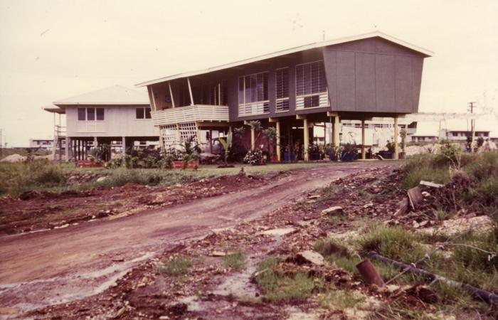 Darwin elevated house with grey side walls and louvres