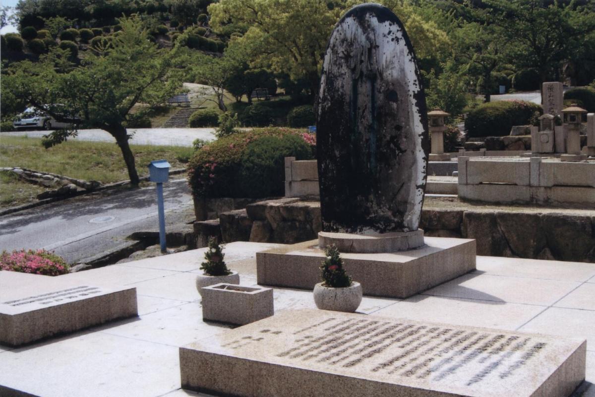 The Fujita family tombstone in Japan, featuring a propeller blade from the USAT Meigs.