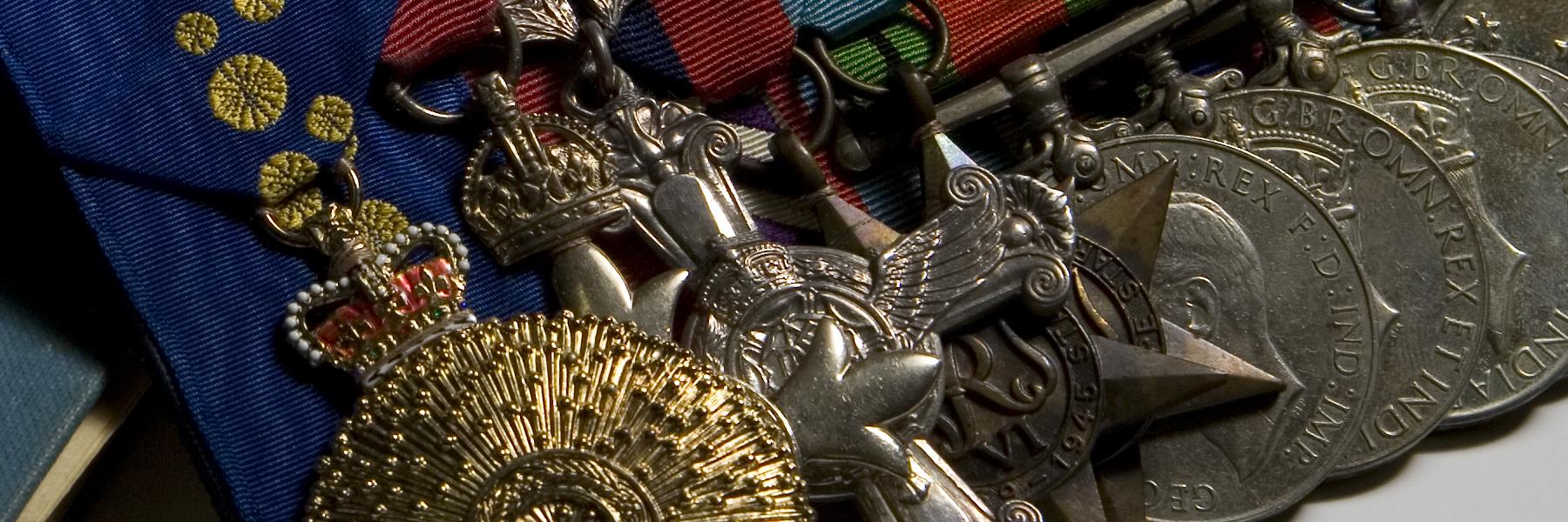 Flying log book and war medals belonging to Sam Calder