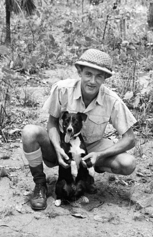 Leading Aircraftman Percy Leslie Westcott with Gunner the Kelpie puppy