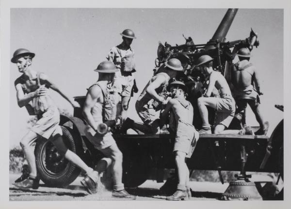 3" mobile anti-aircraft gun (now positioned outside Larrakeyah Army Headquarters) top of cliffs at Darwin oval Esplanade opposite Hotel Darwin