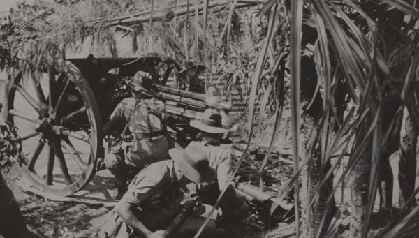 Photograph of soldiers with PDR at full recoil.