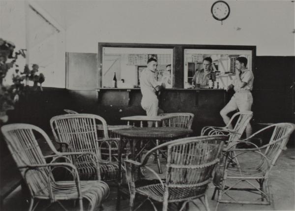 Photograph of soldiers at the officers mess.