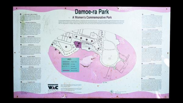 Original Damoe-Ra Park signage, A Women's Commemorative Park, depicts a map of the area and significant historical spots.